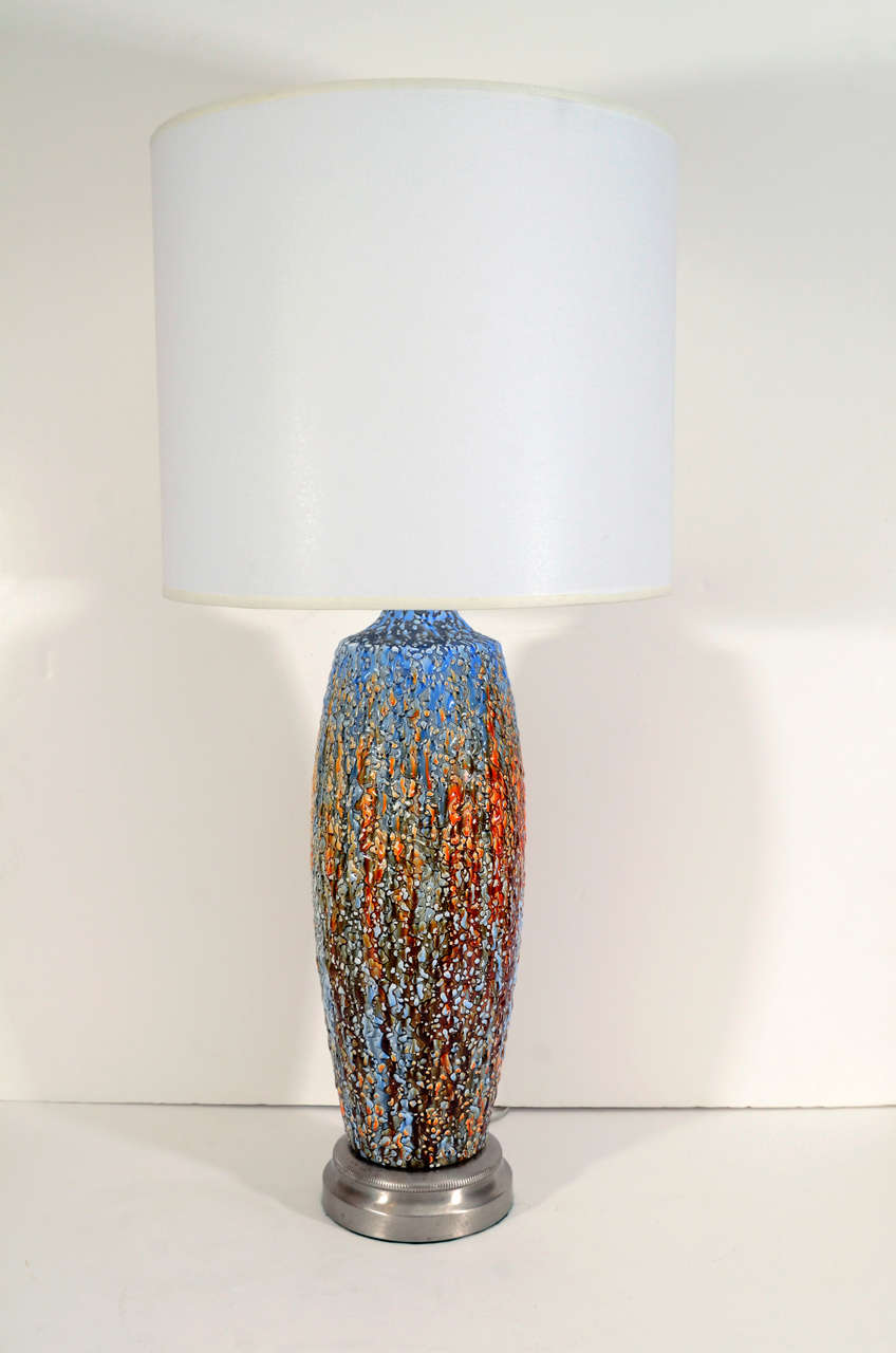 Exceptional pair of multi colored drip glazed ceramic lamps on satin nickel bases.