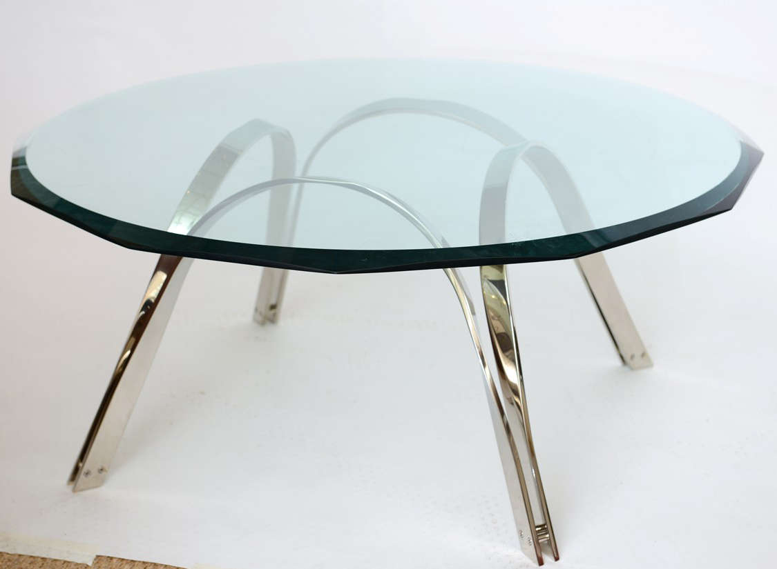 This wonderful nickel silver table in the style of Roger Sprunger for Dunbar
is very sculptural with it's arches. The table base is is 22