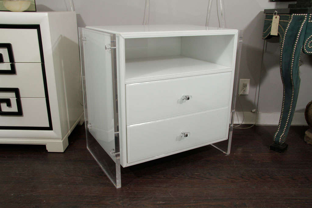Made to order, custom pair of reverse painted glass nightstands with Lucite side panels. Custom dimensions and finishes are available. Please inquire with Venfield. 

Dimensions each, as shown:
Width: 32 inches
Depth: 20 inches
Height: 30 inches