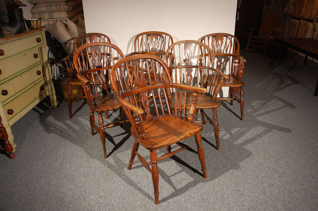 This is a wonderful set of six matching English sack back Windsor chairs. They are super comfortable and have a great old mellow patina.They are in wonderful condition with old repairs and great surface.They are sold as a set of six only.