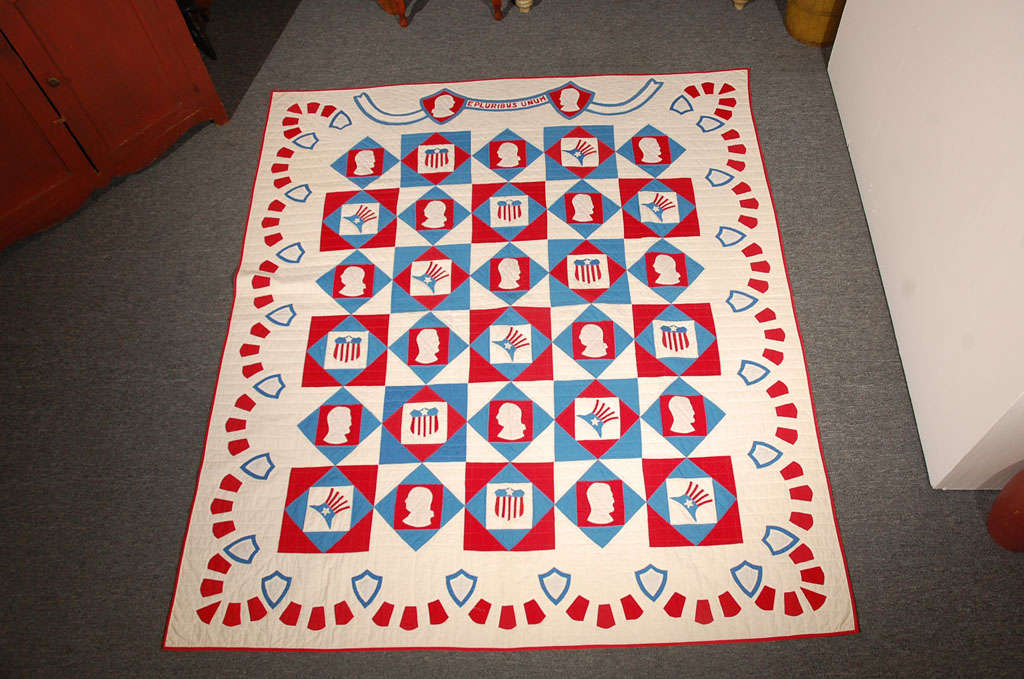 This is such a fine example of Americana at its best. This fantastic applique quilt has the profile of George Washington and Abe Lincoln along with the Uncle Sam hat and the Patriotic shield in every other block. The wonderful swag border also has