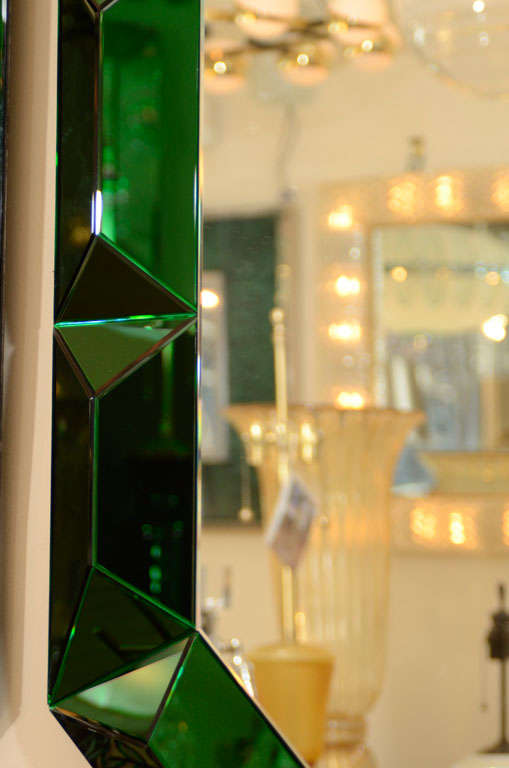 Italian Large octagonal mirror with faceted green glass surround