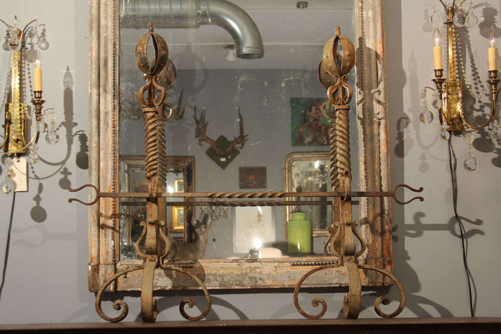 Large pair of andirons with cross bar.