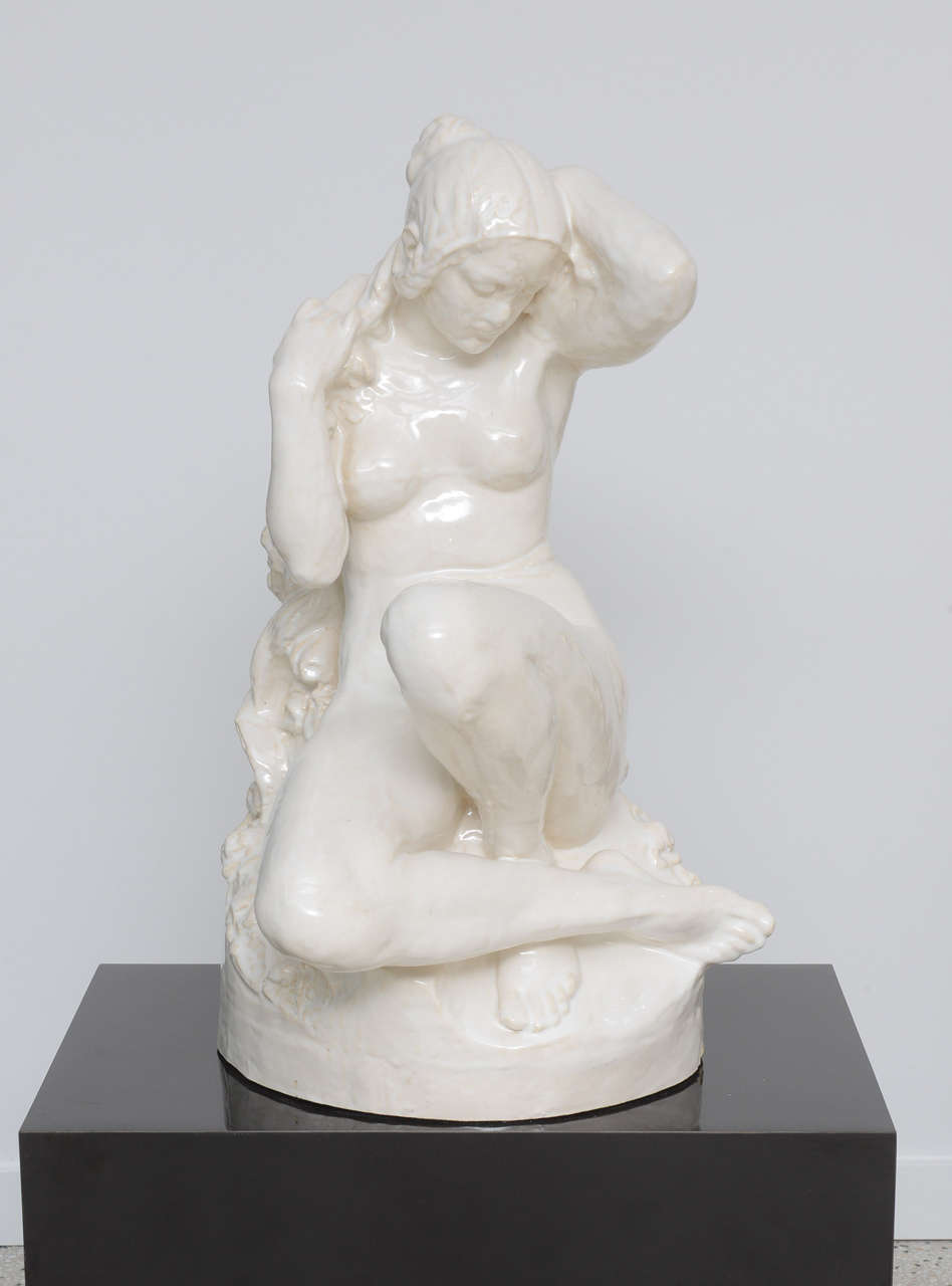 This stylish piece was acquired from a Palm Beach estate and dates to the early part of the 20th century.  The piece has overtones of the Art Nouveau and Art Deco period with the sensual pose of the figure.

Note:   Black base is not included in the