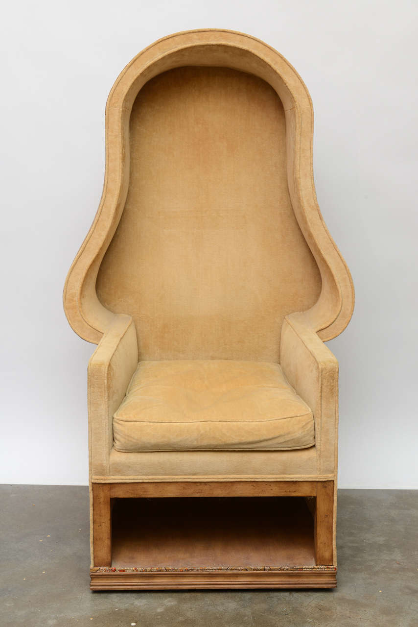 Exotic and stylish mid century canopy chair with storage at the bottom for book, newspapers, etc.