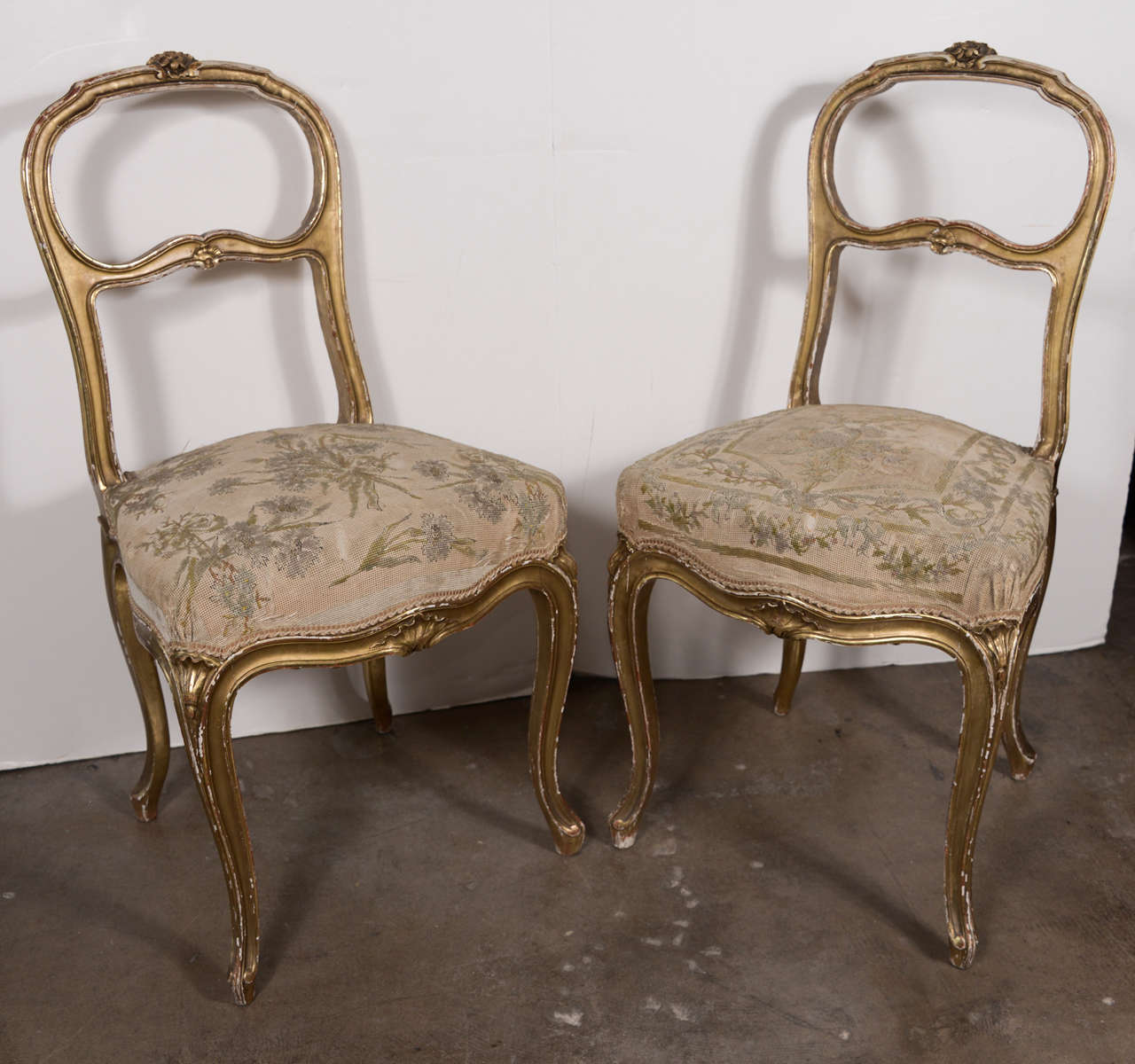 Pair of 18th century gilt ladies' chairs.