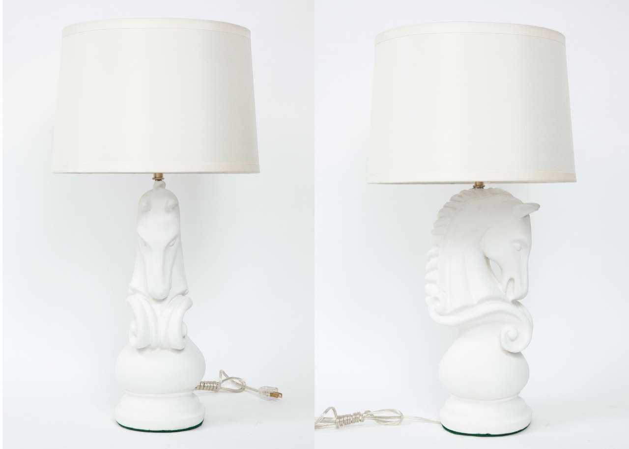 Fantastic pair of stylized Horse pawn lamps in matte white gesso over plaster.