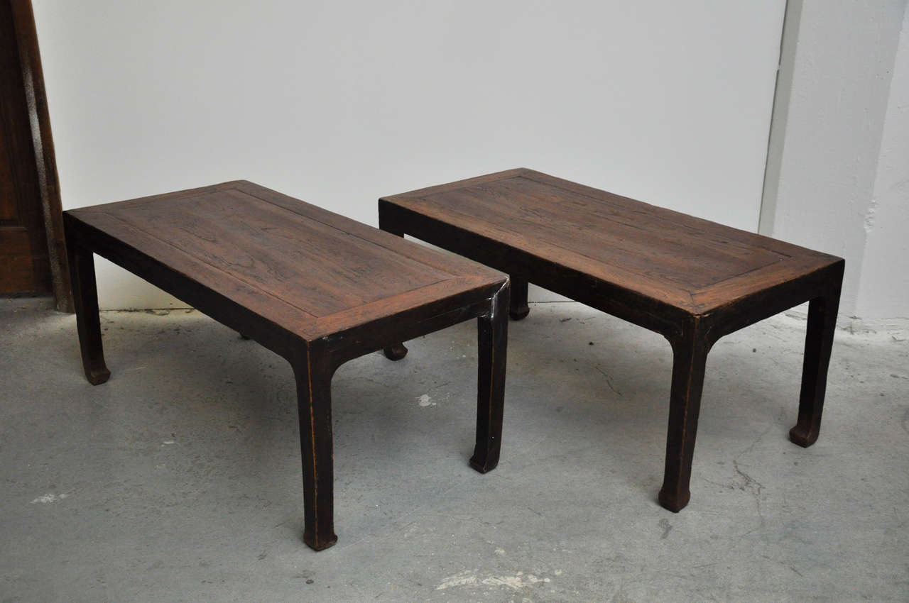 19th century pair of Chinese coffee or side tables. Beautifully constructed of wood. Originally used for meals while seated on the floor. 

Dimensions: 44.5