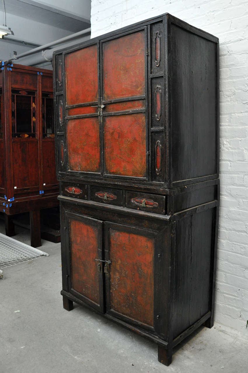 18th century painted Chinese black lacquer two-piece cabinet
This cabinet is a wonderful tailored design with the opportunity to separate the pieces and use as two cabinets
Condition of lacquer is poor and could use restoration
The structure is