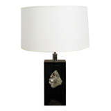 A Resin and Metallic Ore Table Lamp.