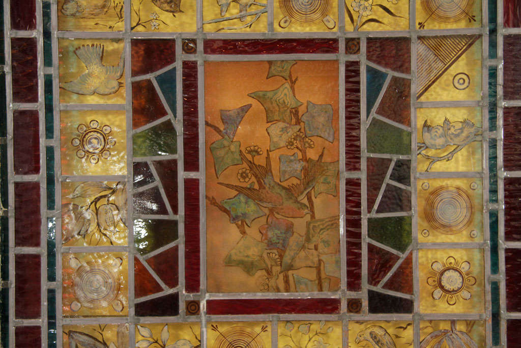This stained and painted glass window, composed of over thirty pictorial panes,   provides a quintessential survey of the Aesthetic Movement's visual vocabulary.  