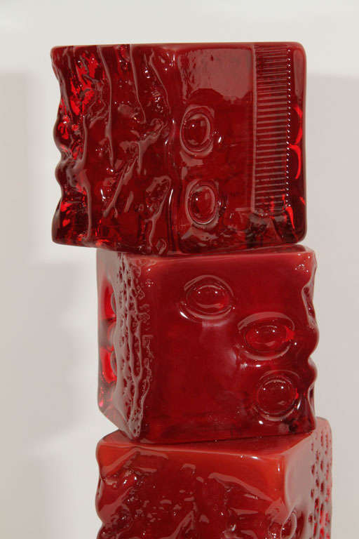 Composed of Five Stacked Red Glass Cubes<br />
with mottled organic inspired surface texture