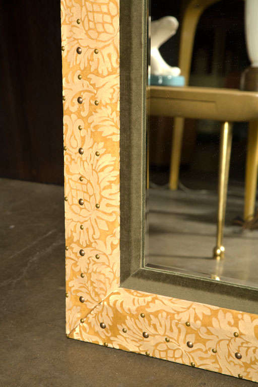 Paul Marra mirror with  Italian damask suede with velvet and antiqued brass nail heads.