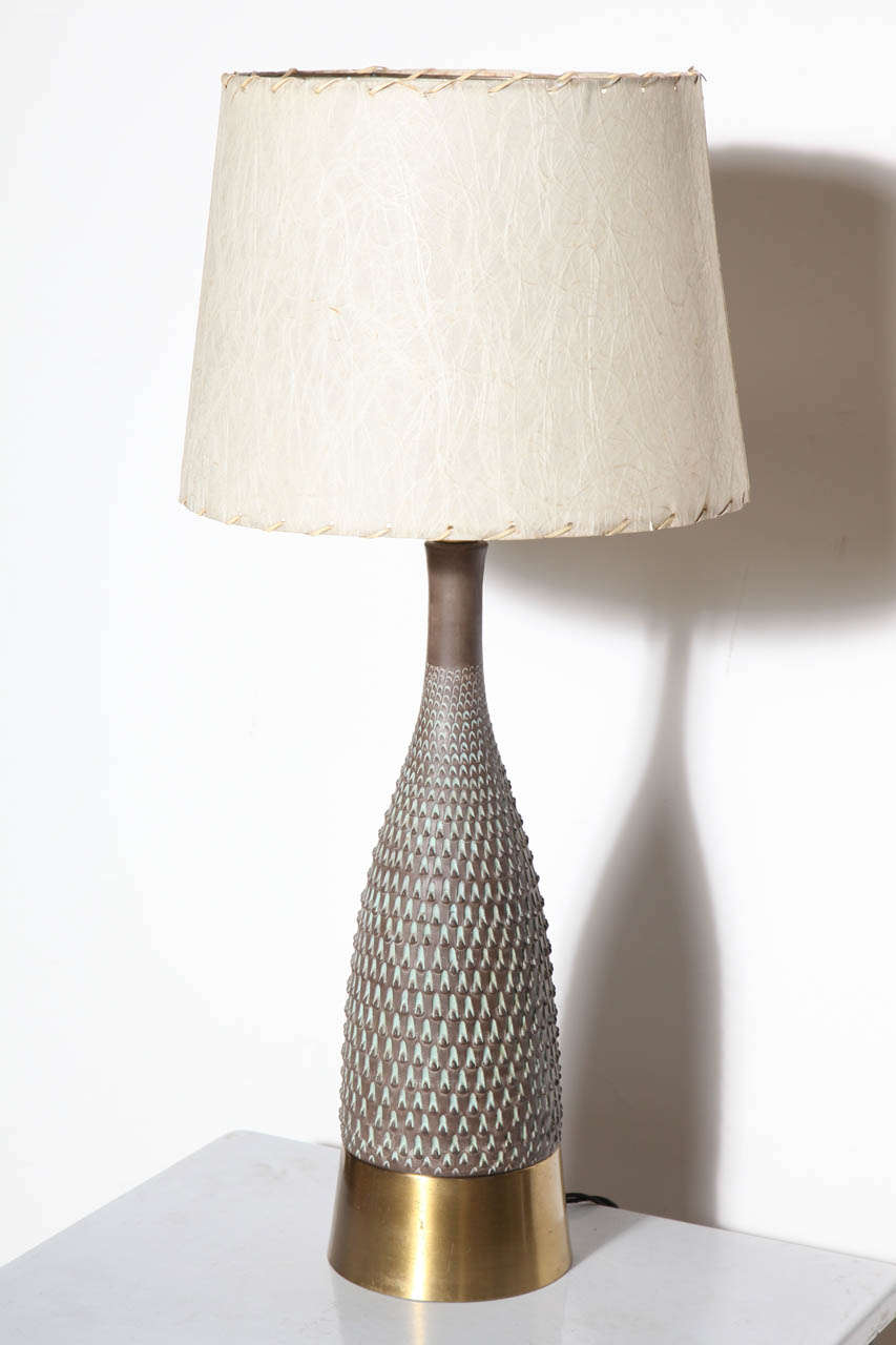 Sgrafito Ugo Zaccagnini Ceramic Lamp with textural matte Dark Brown pine cone relief against a Pale Blue Green, Robin Egg background.  Complete with Brass hardware and Base and old style opaque glass diffuser Shade.  Measurements: (ceramic portion