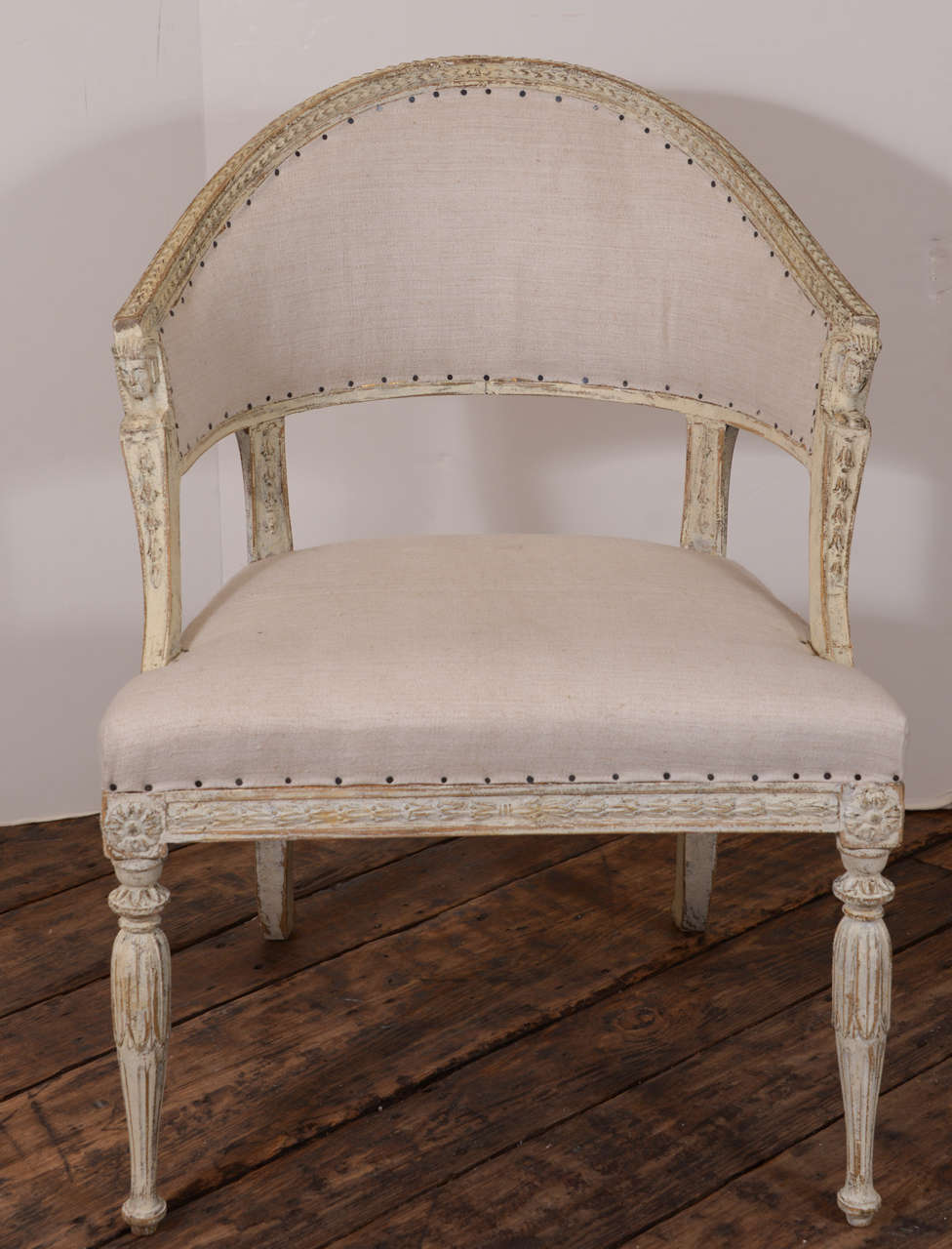 Stunning set of 4 Gustavian Barrel back chairs in original paint. Upholstered in an antique linen.