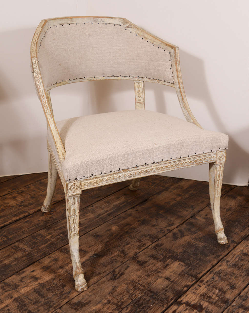 Gorgeous Swedish Barrel back chair with hoof feet, Gustavian period, upholstered in antique linen.  A fabulous chair.
