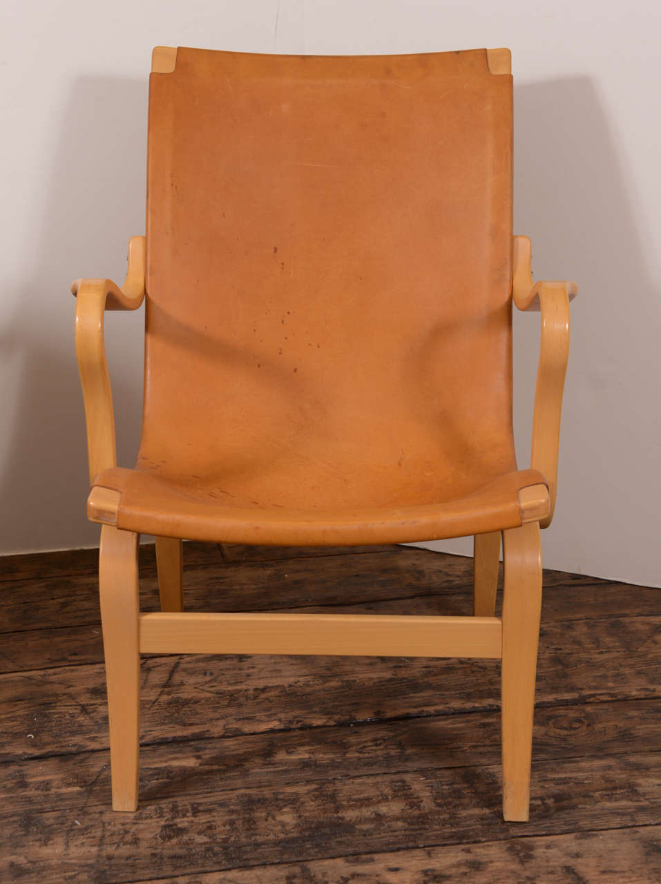 Pair of handsome vintage Bruno Matthson Mina chairs, 1978
Camel colored leather, some old stains on the leather as you can see in photos.  Great condition though. Very comfortable and classic chairs!
