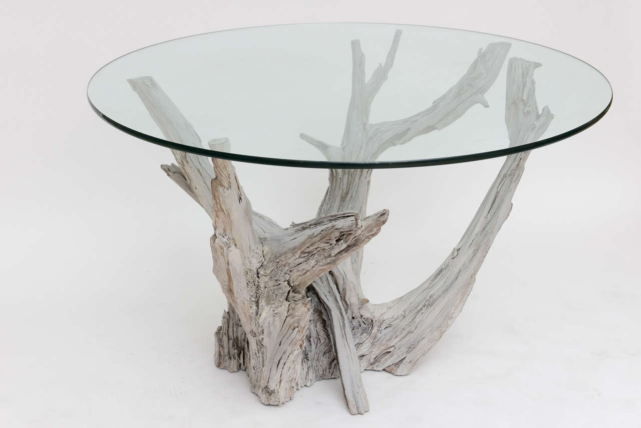 Greige 1950s driftwood table with half-inch glass top. Center hall, small dining table or dramatic bedside!