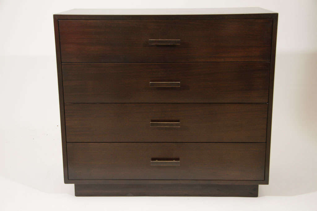 Simple, tailored case on a plinth base. Top drawer divided in 3.  Located at 163 Ludlow Street 212-982-0608.