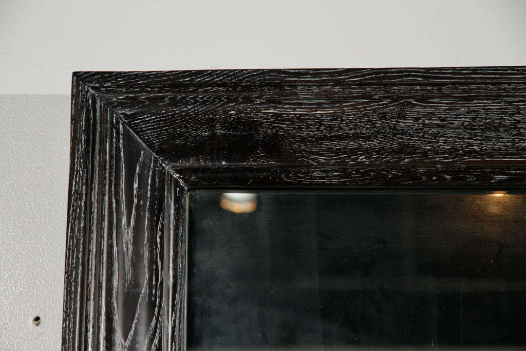 Exceptional cerused oak framed mirror designed by James Mont.