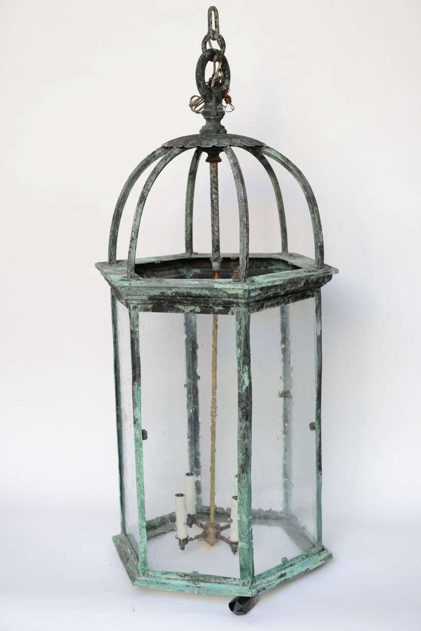 Beautiful antique copper lantern ,from palm beach estate.great look and patina .
New brass harp with 4  60/watt lights ,the lantern is ready to hang .
  