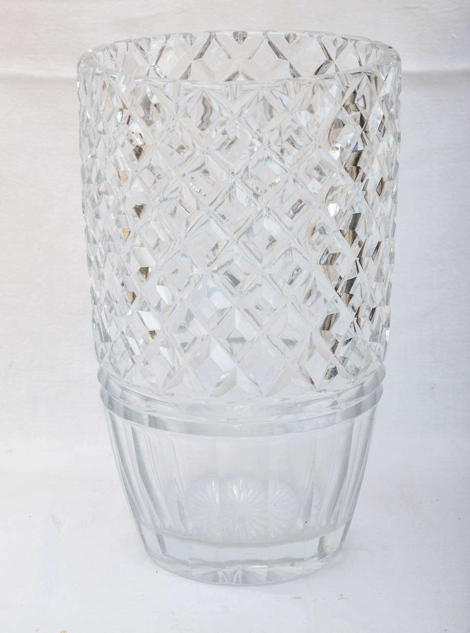 English Victorian Large Cut Crystal Vase. Ideal for Flowering Branches. Top Three Quarters Of Vase Is Cut With A Diamond Pattern, Below Which Is a Double Incised Band Above A faceted Pattern. The Underside Is Cut With A Star Burst Pattern.