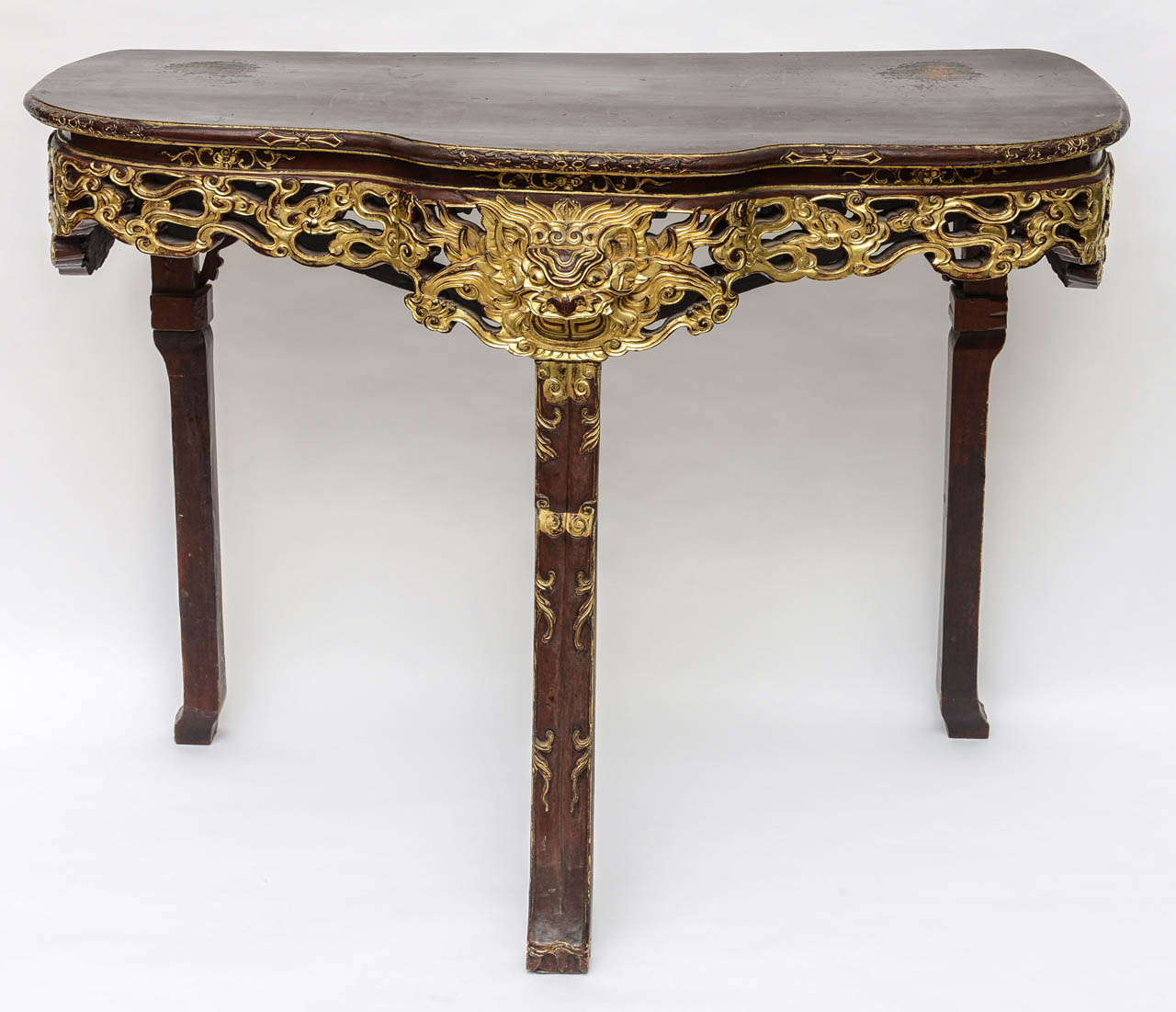 Chinoiserie Hand-Carved Console Table with three legs from the 19th century. 
Handmade carved Wood with Gold Leaf Finish.
In good vintage condition with some normal scuffs and marks.