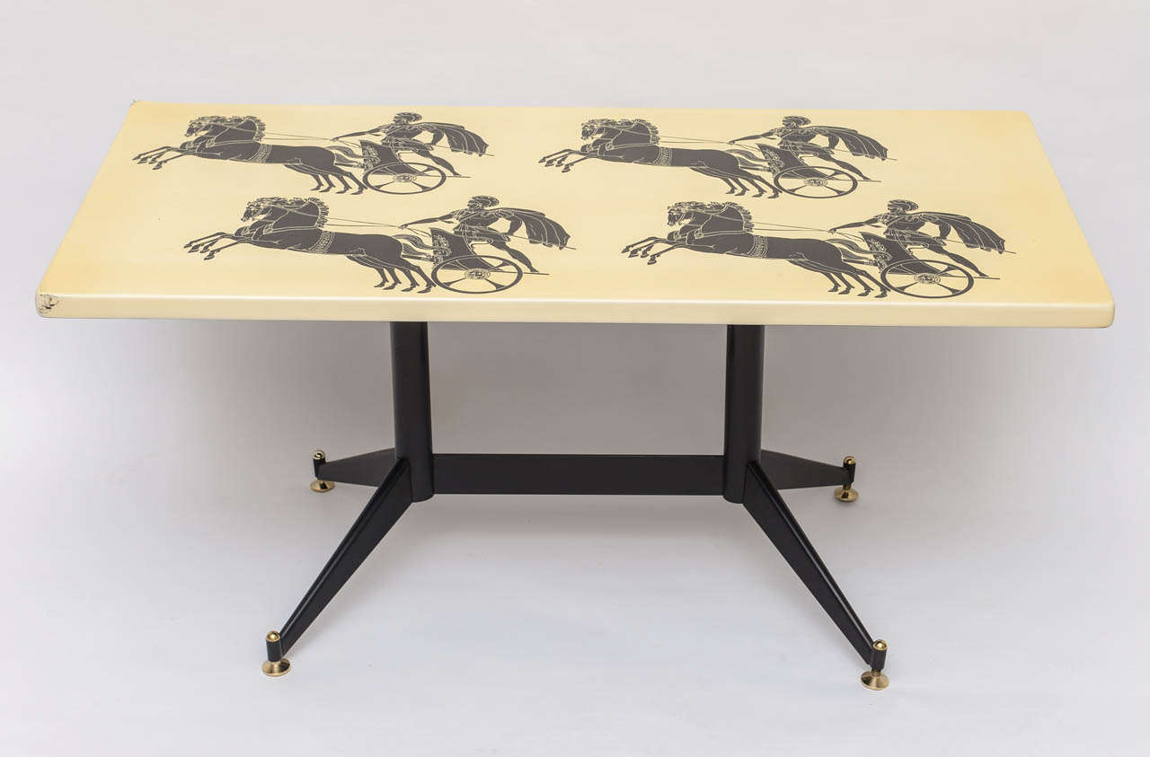 Fornasetti coffee table featuring Roman four horses with carriage in a race.