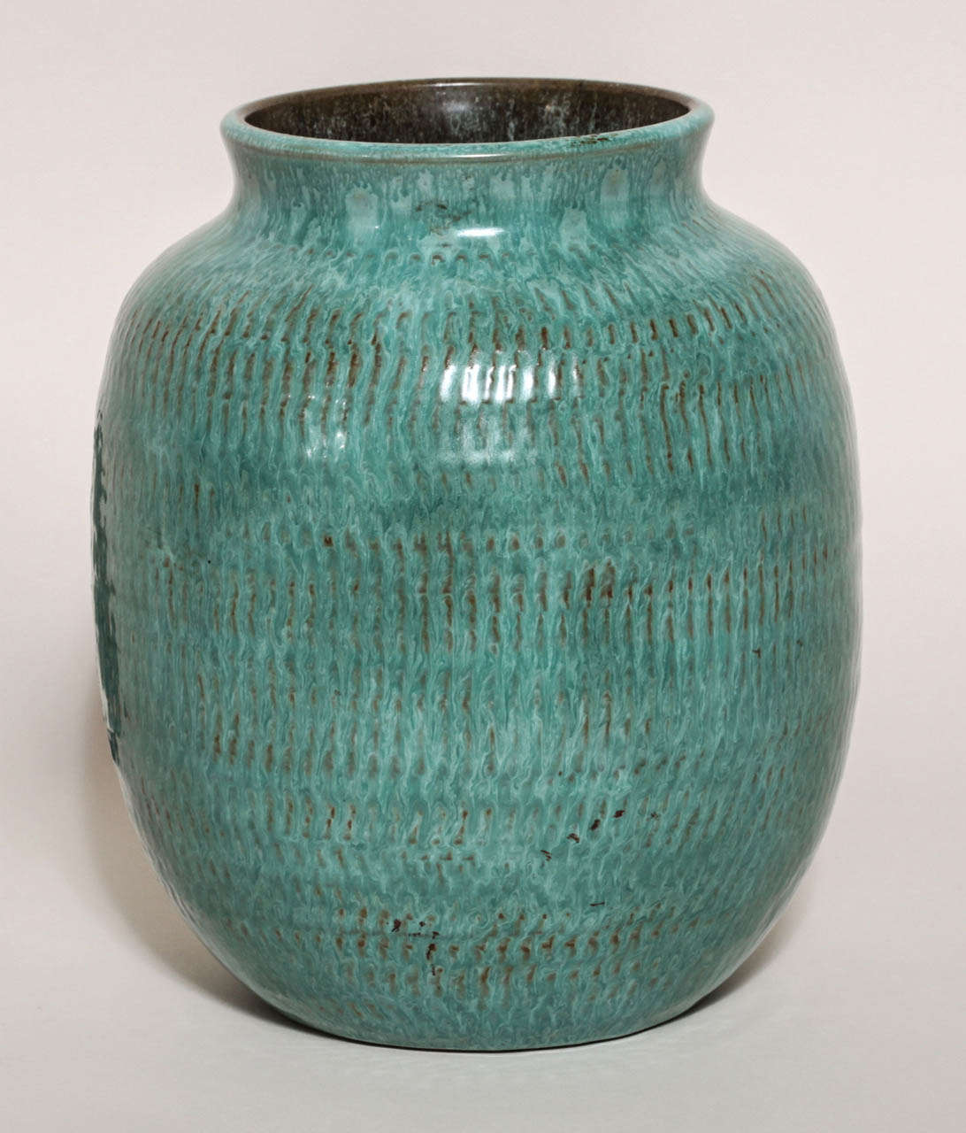 Vase with mottled turquoise glaze over textured ground.
Signed: incised DELACHENAL/ SEVRES MANUFACTURE NATIONALE FRANCE in cartouche/ GT in rectangle.