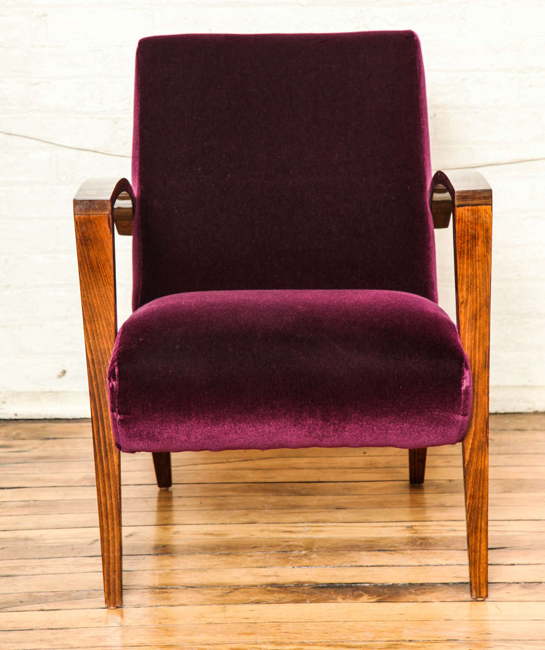 Mid-Century Modern pair of armchairs. Palissandre frames with aubergine silk mohair upholstery.