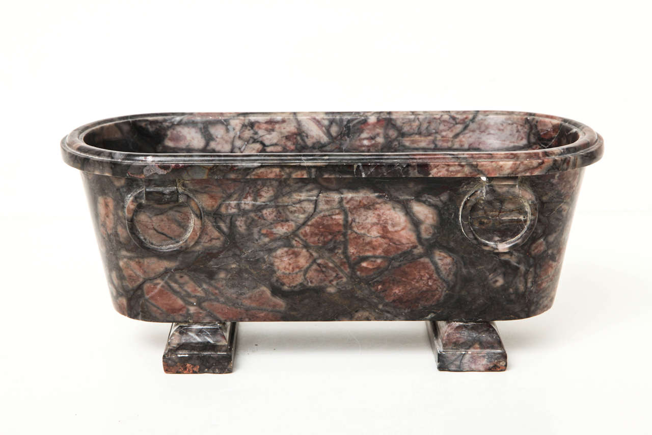 A 19th century Italian Grand Tour model of a Roman marble bath in variegated pink and gray marble