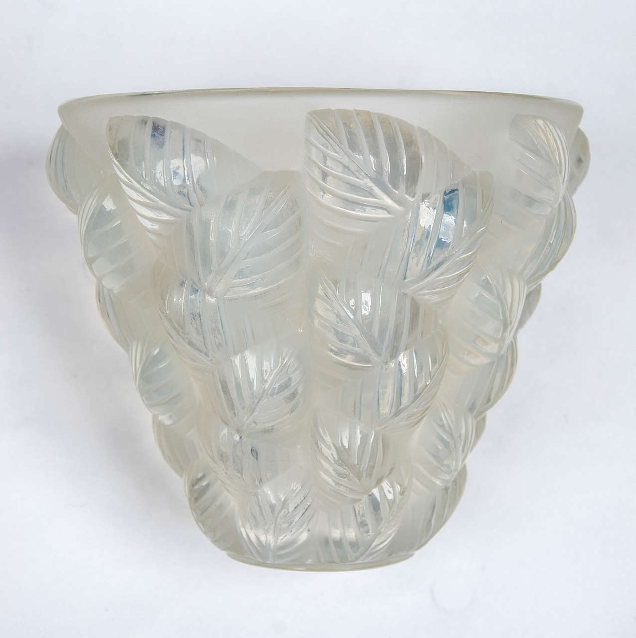 Mossaic, an Art Deco blue opalescent glass vase by René Lalique, (1860-1945). Relief decorated with a geometric leaf design. Excellent original condition.