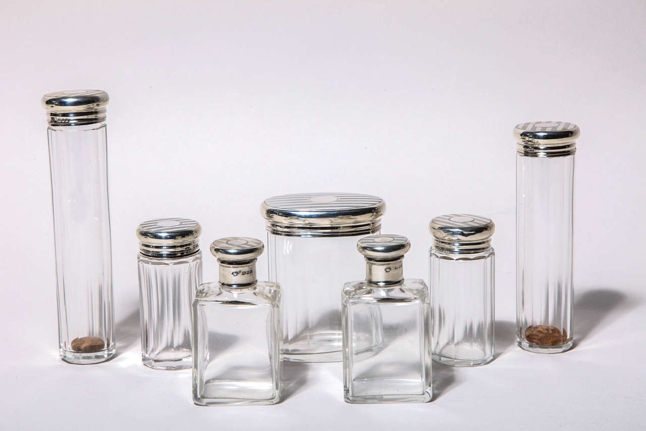Comprising pair of scent bottles with silver screw tops 3 9/16
