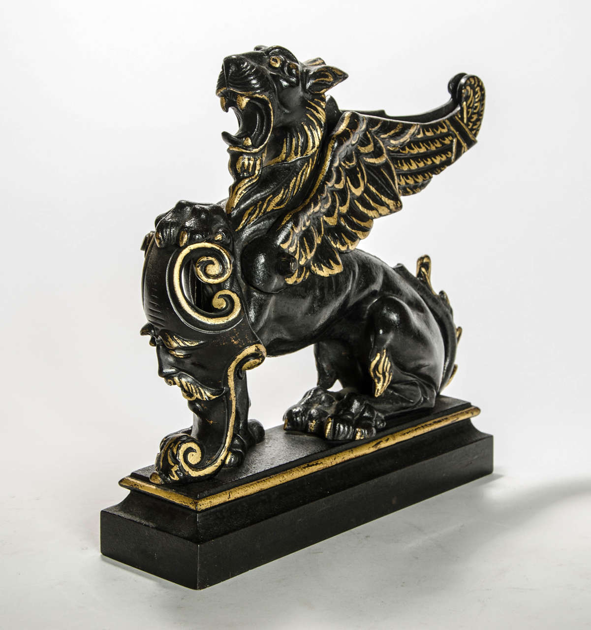 A door stop in the form of a winged Griffon: English, circa 1850.