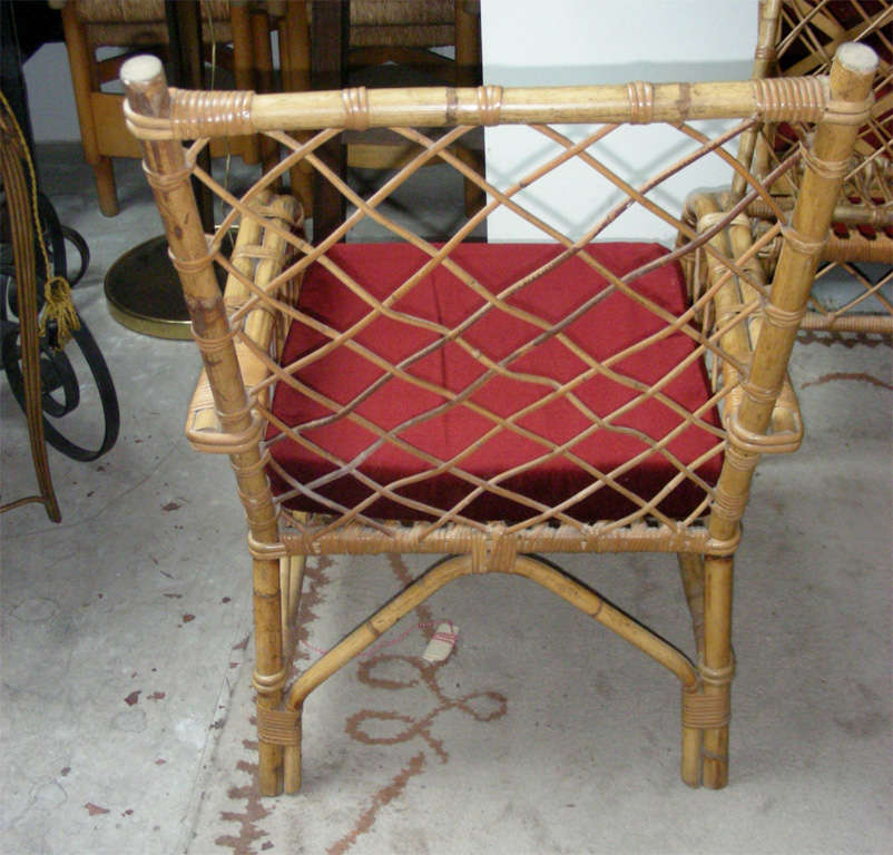 Mid-20th Century Louis Sognot Pair of Rattan Armchair with Good Condition Rattan