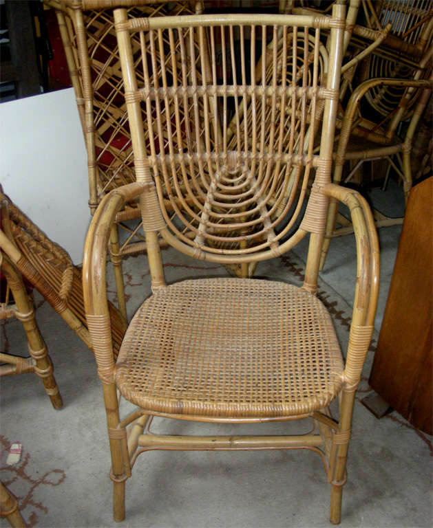 French Riviera Set of Two Armchairs and Four Chairs in Rattan For Sale 1
