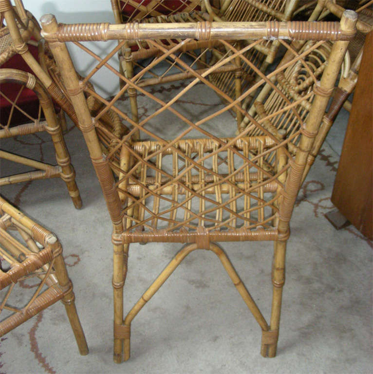 Mid-20th Century Louis Sognot Pair of Rattan Chair in Good Rattan Condition For Sale