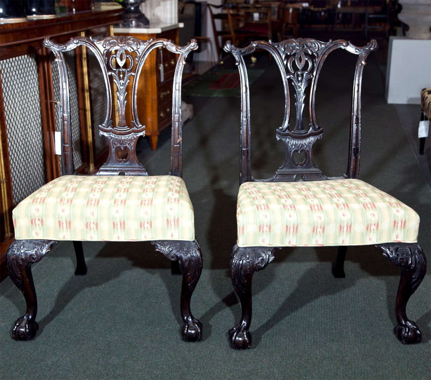 A set of six English mahogany, Chippendale-style side chairs.