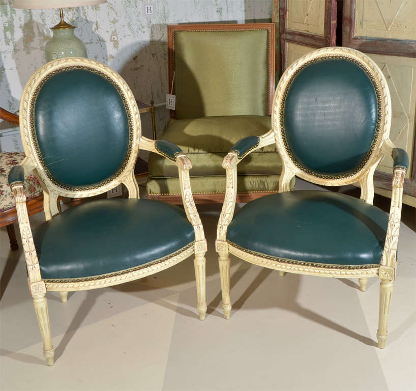 Pair Louis XVI Style Painted Fauteuil Arm Chairs, brass nail heads, green leather upholstery