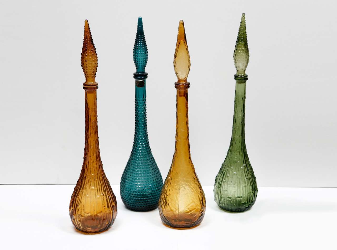 MID-CENTURY MURANO BOTTLES WITH GLASS STOPPERS.  BOTTLES ARE SOLD INDIVIDUALLY.