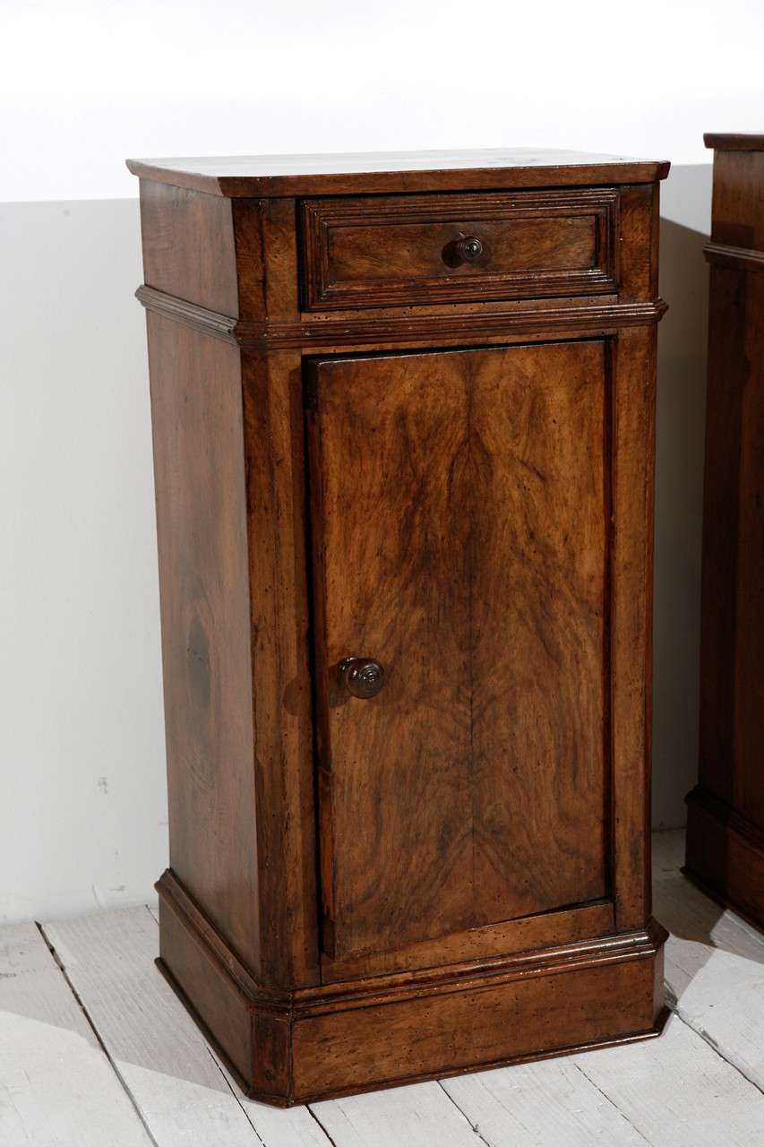 Tall traditional burled walnut nightstands with one door and one drawer.