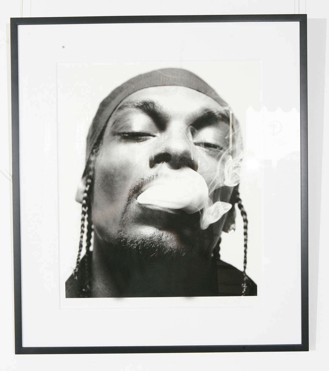 A fantastic custom framed black & white photograph of Snoop Dogg by American film/music video/commercial director and photographer, Anthony Mandler. Pencil signed and dated by the artist (see last image).