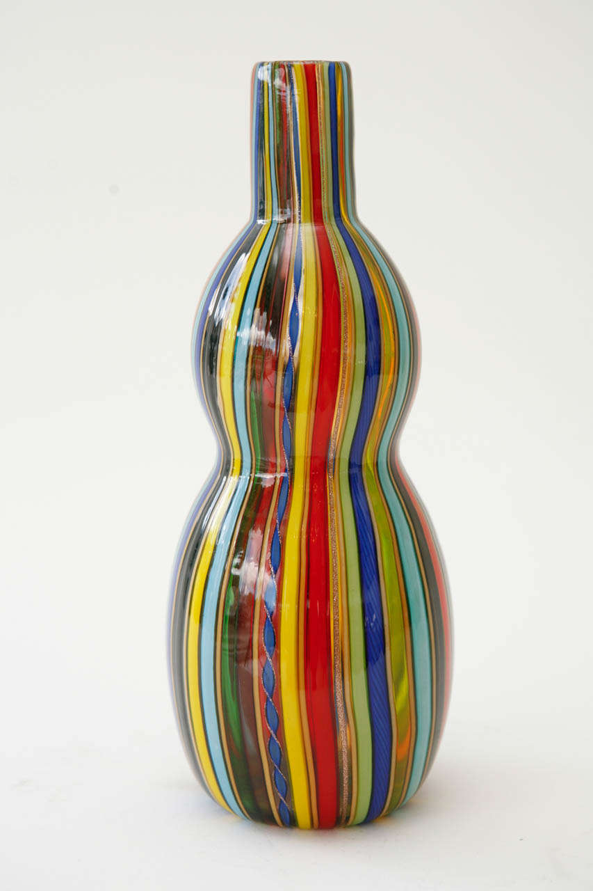 A colorful, striped gourd-shaped Murano glass vase, signed Cenedese (see Images 7 & 8).