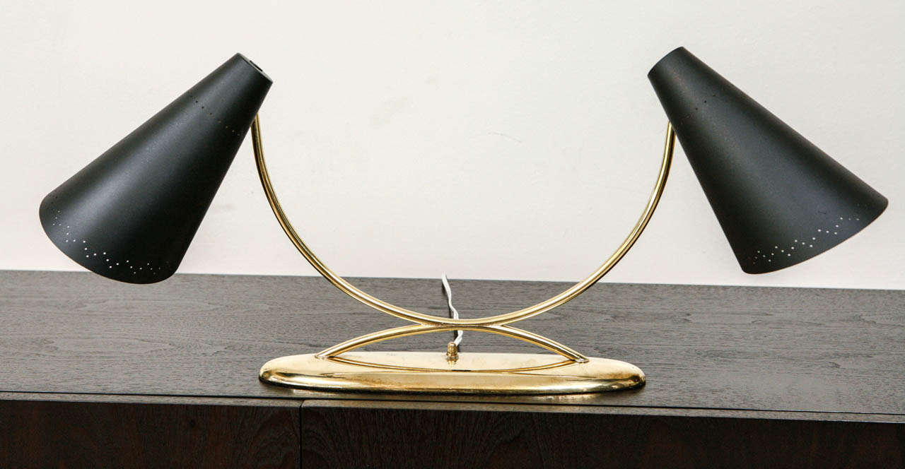 Vintage Double Arm Desk Lamp by Lightolier.
Original paint to shades. Shades articulate on multi-directional pivot.