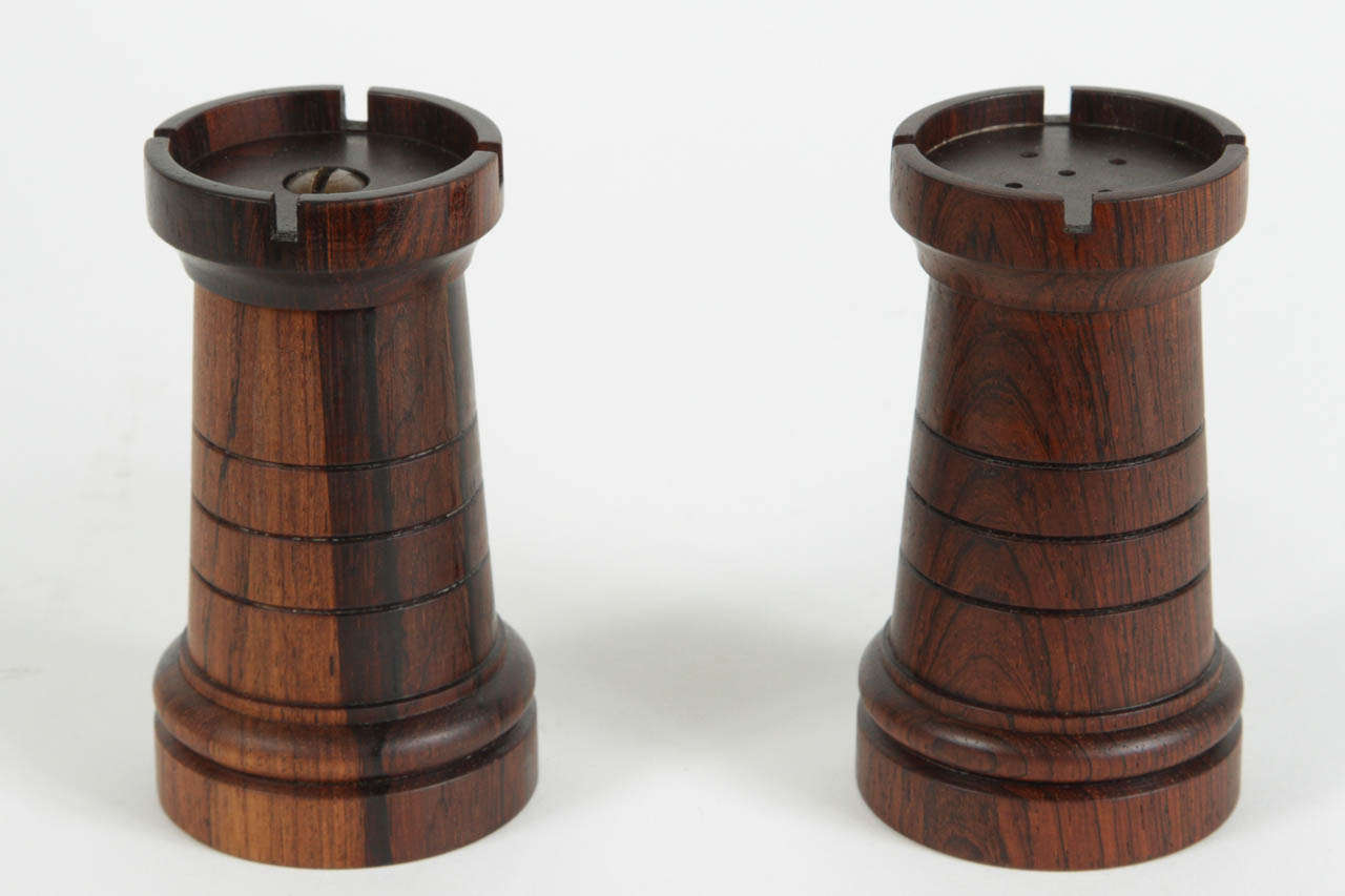 An exceedingly rare rosewood salt and pepper set in the form of castle turrets (or a pair of 