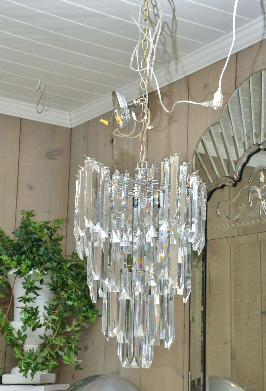 Fabulous and rare pair of Mid-Century Lucite Chandeliers