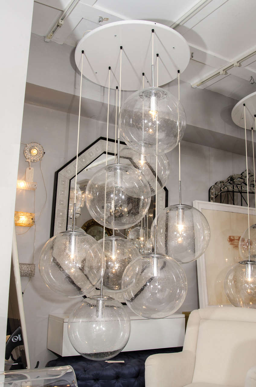 Pair of large 1960s Limburg eight-ball pendant chandeliers.