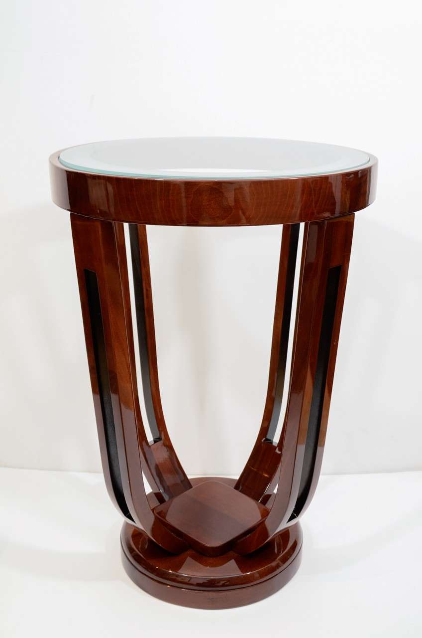 Art Deco round tables. Sandblasted glass and maple stained.
