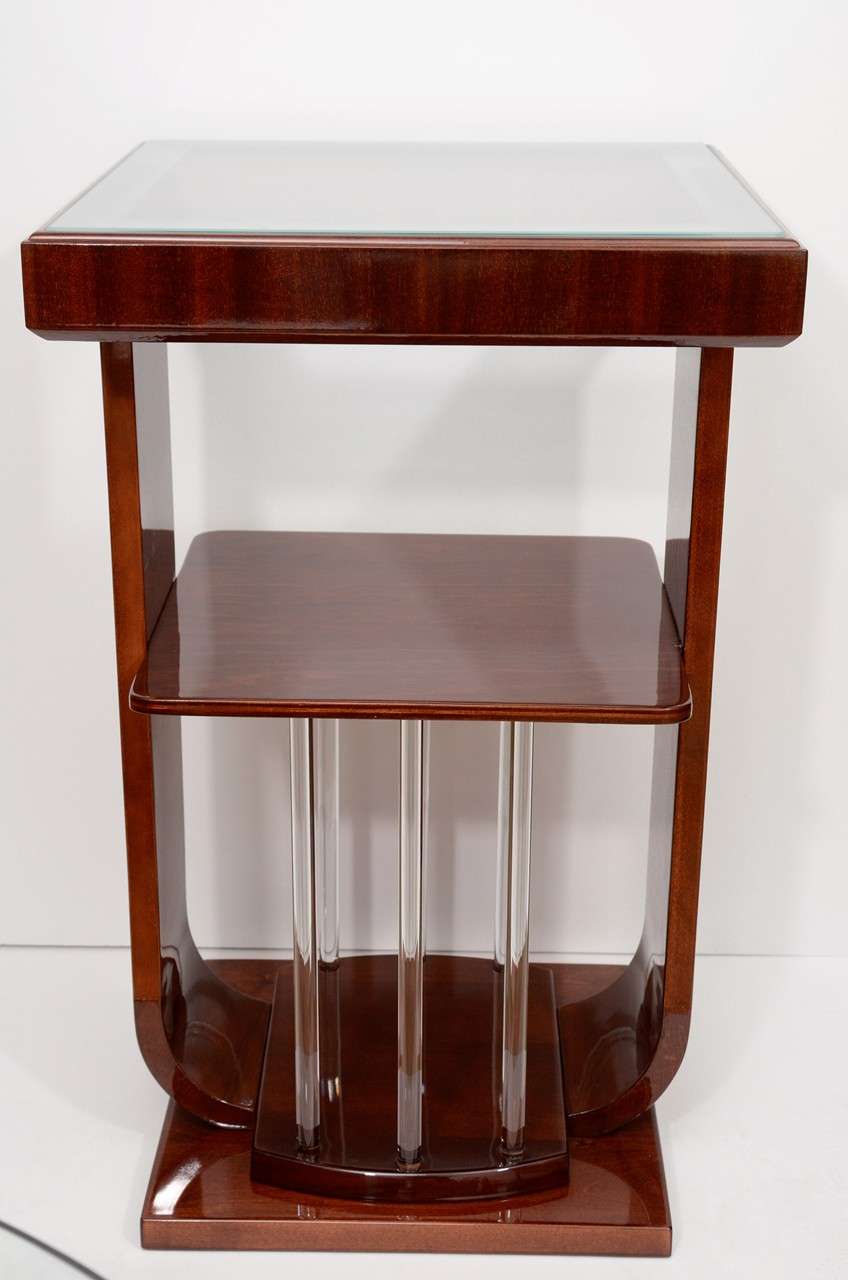 Single Art Deco square lamp table made of mahogany and maple veneer stained, solid maple and solid glass rod accents.
 