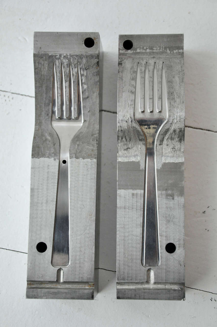 Vintage fork molds, that were used by pouring molten metal into the channels, filling the shape of the spoon and hardening to create the metal utensil. Measurements are for each half.